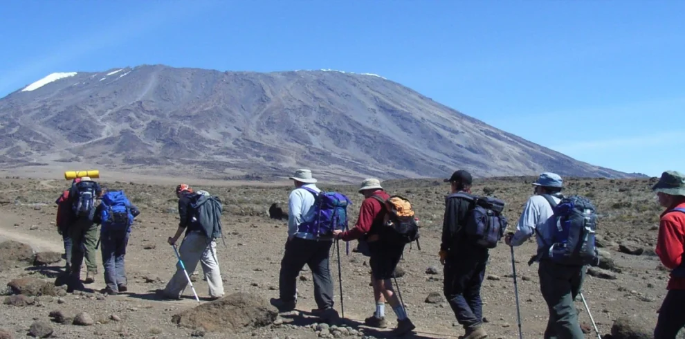 Kilimanjaro rongai route climbers crossing open alpine desert tanzania
