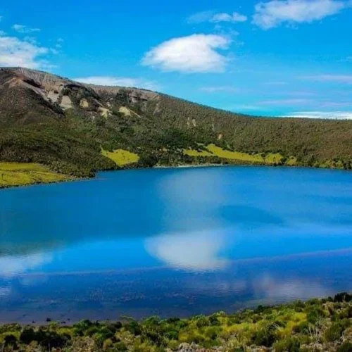 Lake chala crater lake blue water and volcanic rim landscape tanzania