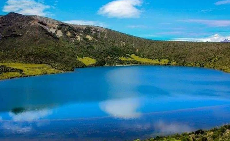 Lake chala crater lake blue water and volcanic rim landscape tanzania