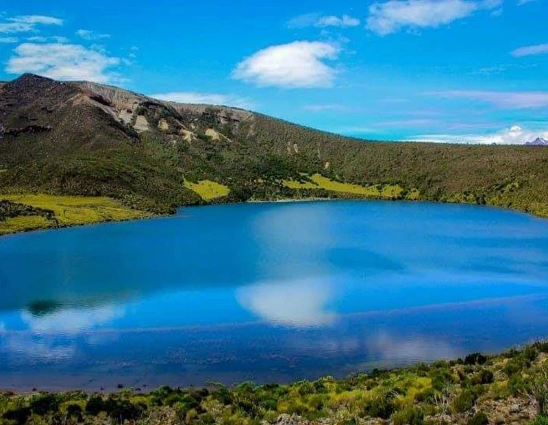 Lake chala crater lake blue water and volcanic rim landscape tanzania