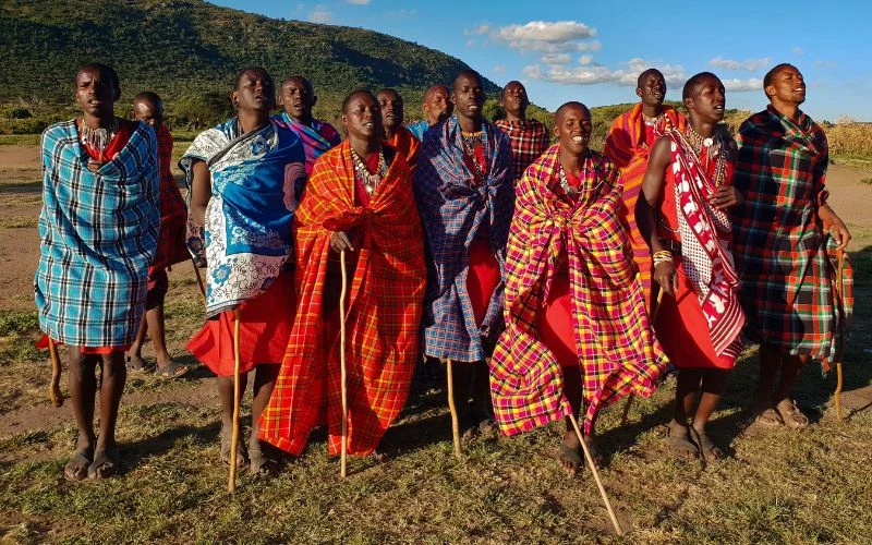 Maasai women in traditional clothing during tanzania cultural experience