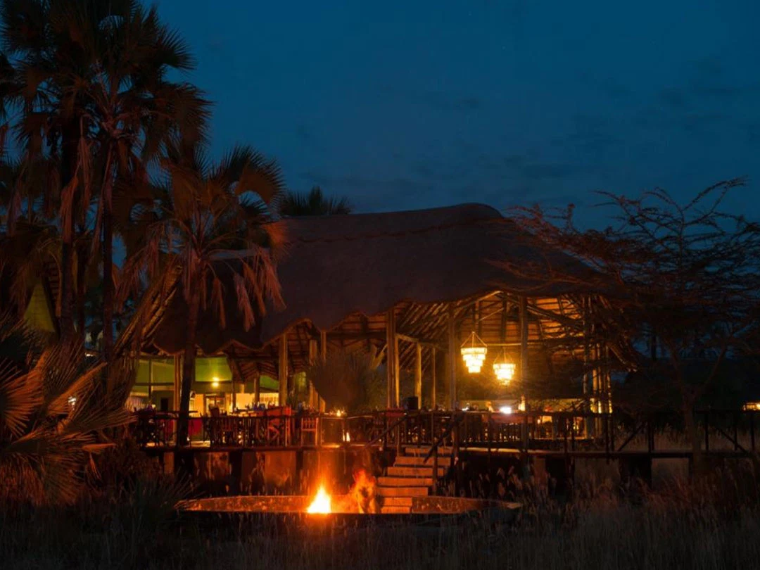 Private candlelit bush dinner at a luxury Tanzania safari camp