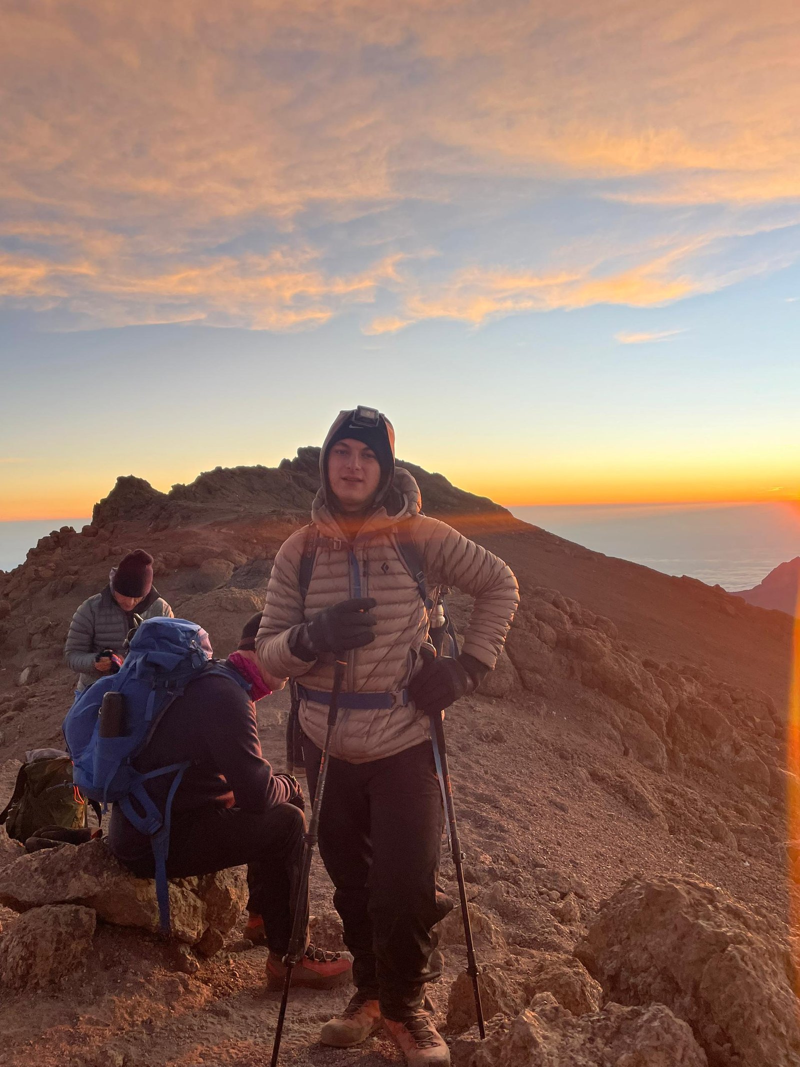Climbers ascending steep rocky Kilimanjaro terrain