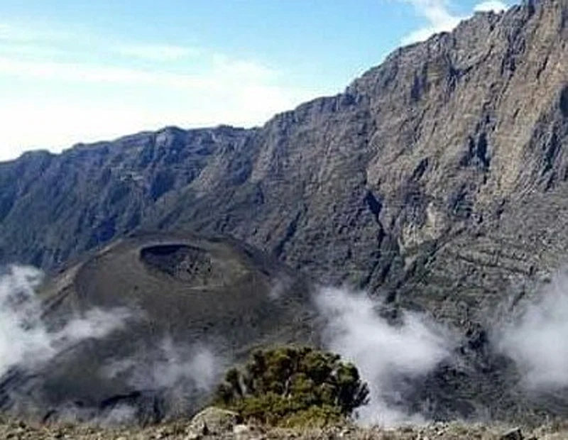 Mount Meru Ash Cone And Crater Rim Emerging Through Clouds Tanzania 1