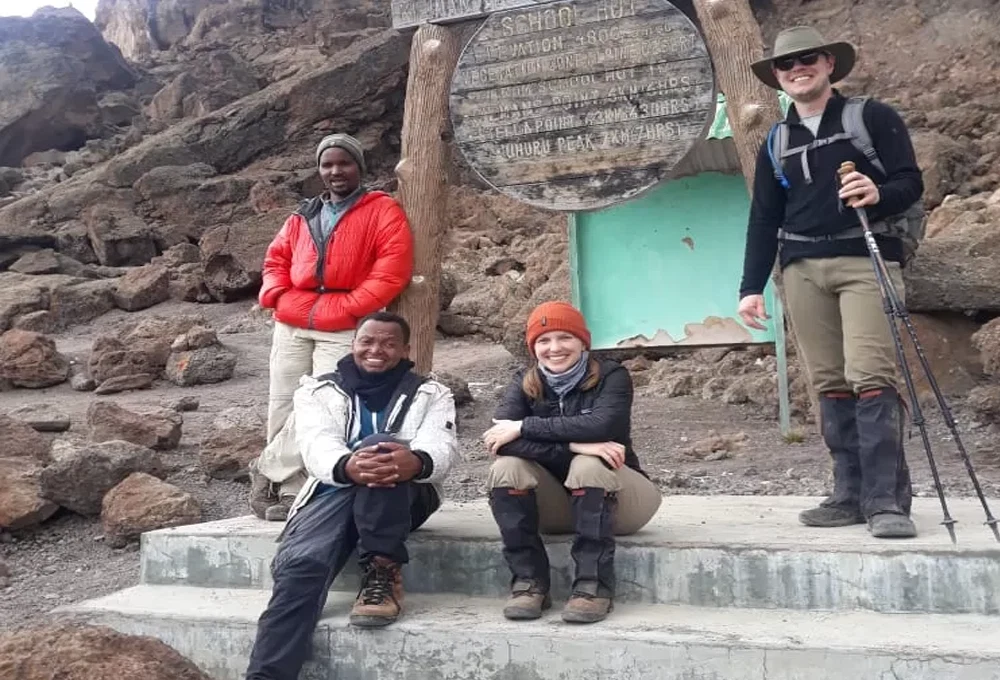 Mount Meru Climbers Resting At Saddle Hut Route Sign Tanzania 1