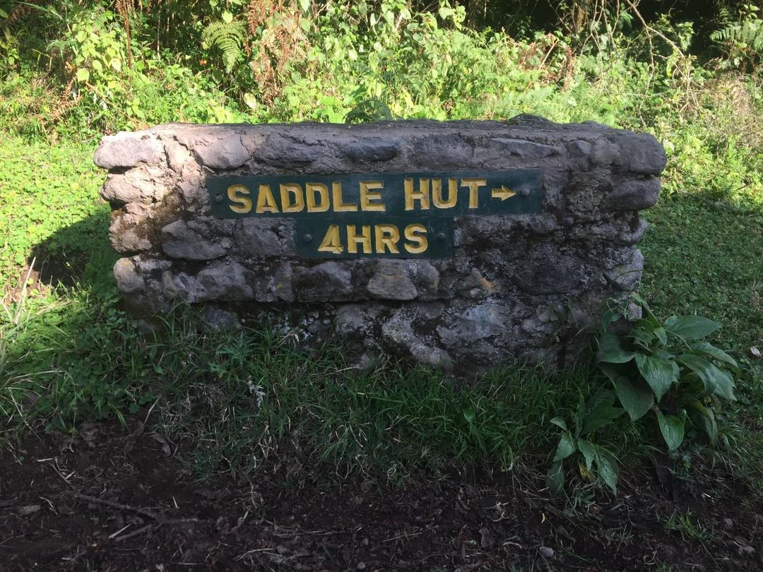 Mount Meru Saddle Hut route sign on a guided climbing trek