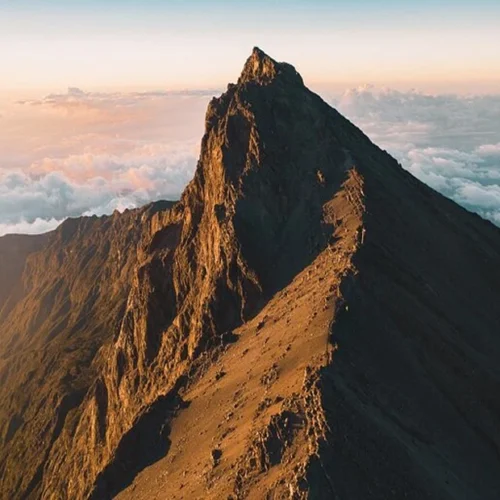 Mount meru socialist peak rugged summit ridge at golden sunrise