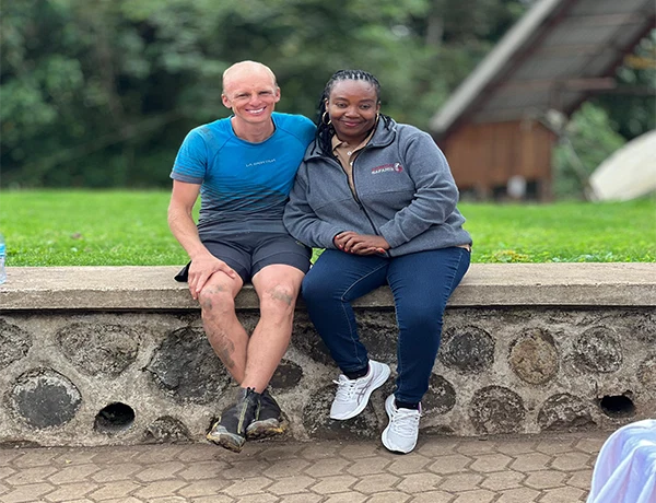 Tanzania Client With Local Tour Professional After Guided Adventure 1