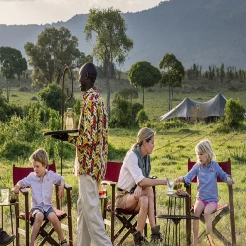 Family relaxing at a safari lodge during a Tanzania wildlife holiday