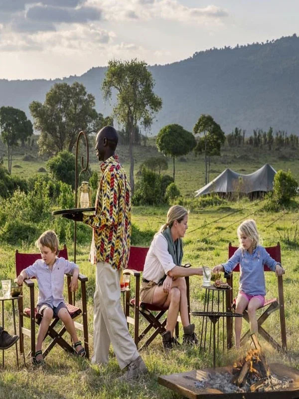 Family relaxing at a safari lodge during a Tanzania wildlife holiday