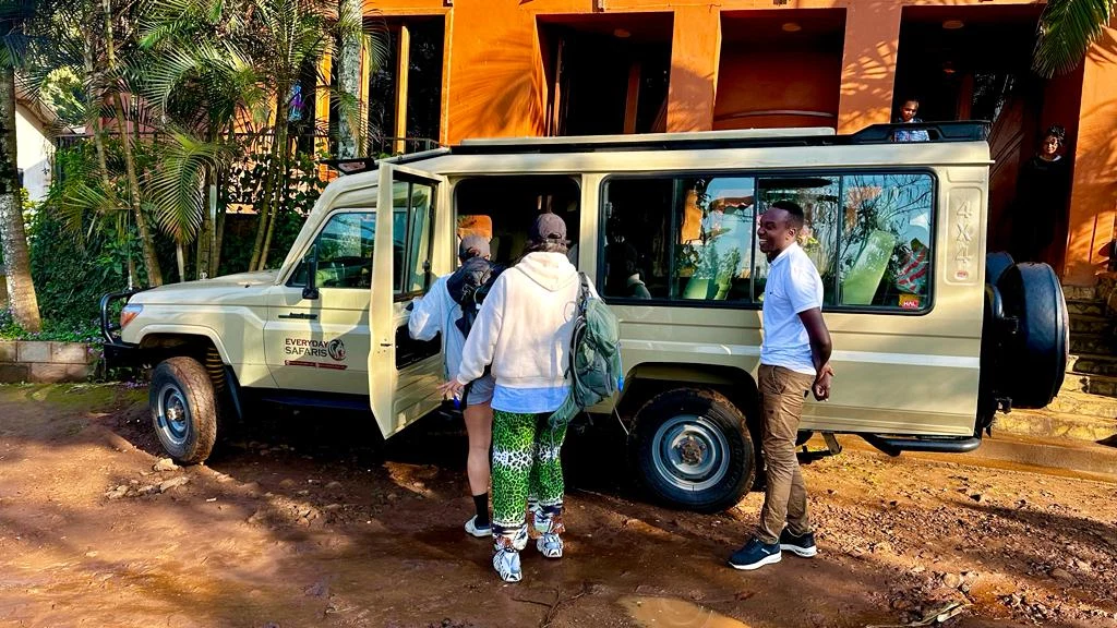 Tanzania Safari Guests Preparing To Board Four Wheel Drive Vehicle 1