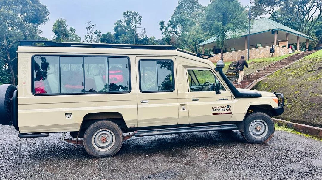 Honeymoon couple preparing for a private Tanzania safari game drive