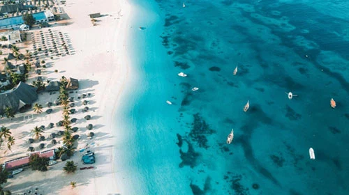 Zanzibar White Sand Beach And Turquoise Indian Ocean Aerial View